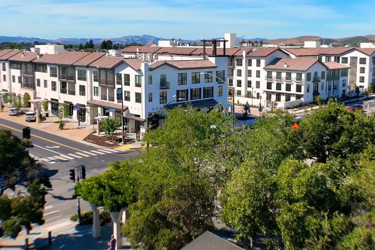 Exterior view of vibrant apartment community in Downtown Livermore, CA.